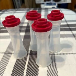 Red and Clear Plastic salt and pepper shakers